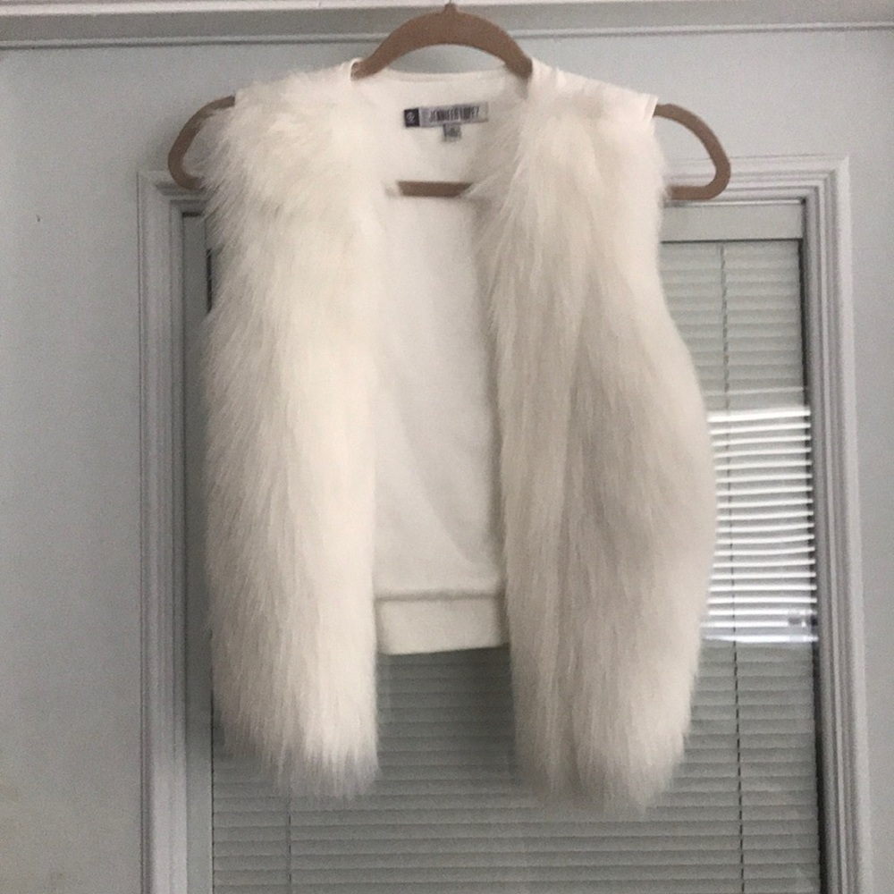 White fur vest